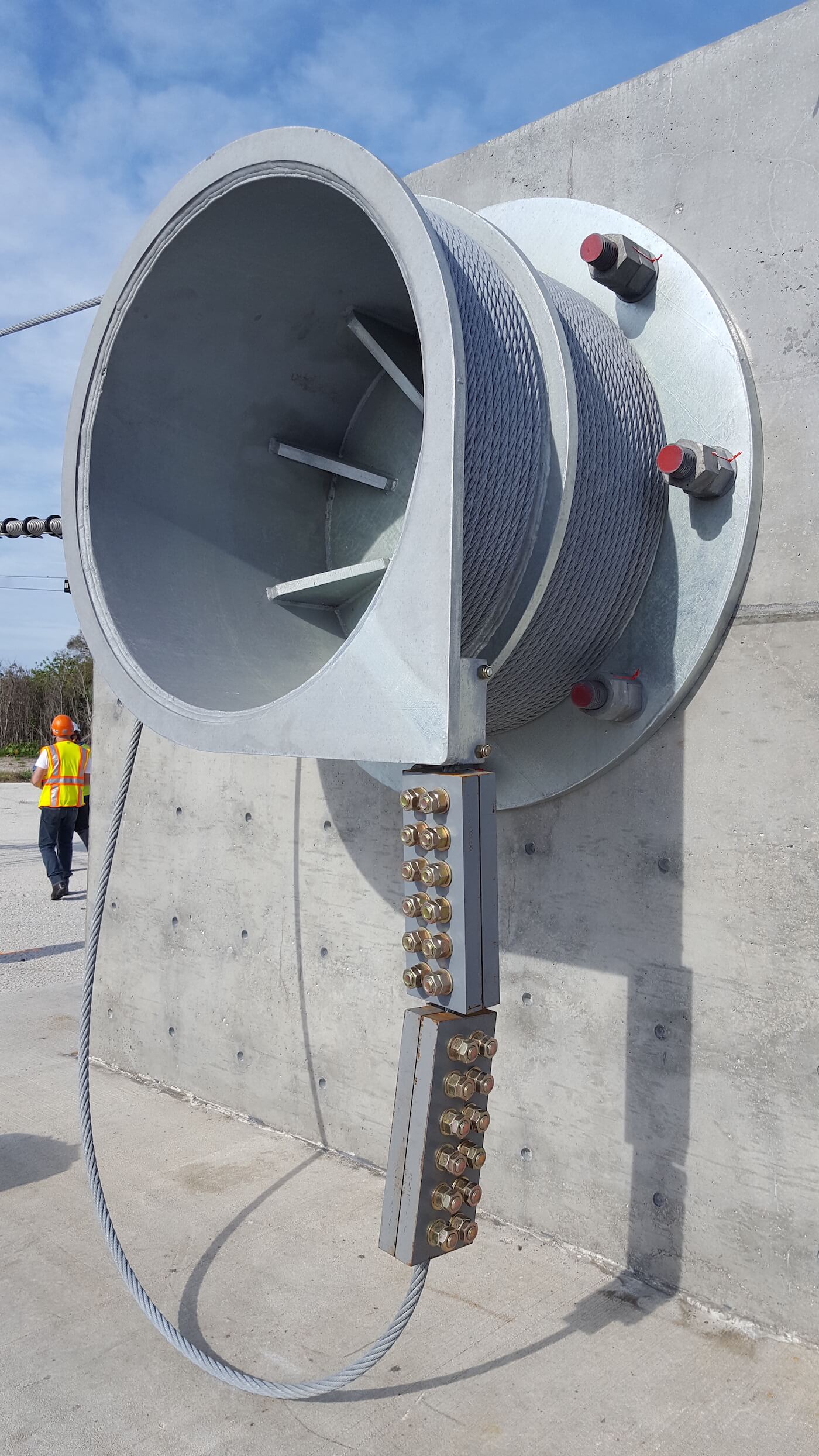 High tension wire rope tie-off bollard with custom cable clamp<br />

